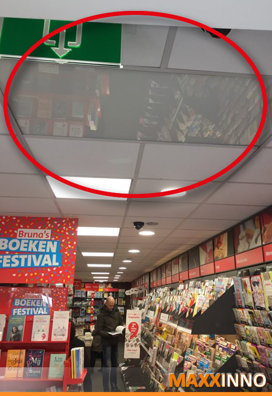 infrarood verwarming in een winkel met iHeatpanel in het systeemplafond voor klantcomfort en energiebeheer